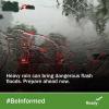 A car stopped at a light, as seen from behind a rain drenched windshield. Heavy rain can bring dangerous flash floods. Prepare ahead now. #BeInformed