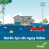 rising flood water with submerged car and other debris