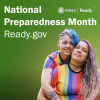 Two women wearing rainbow shirts hug. National Preparedness Month.