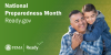 A son hugs his father from behind. National Preparedness Month.