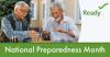 Two older men play chess. National Prepardeness Month.